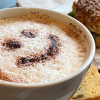 Kaffeetasse mit Schaumsmiley