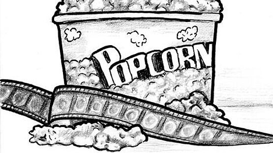 Becher Popcorn mit Filmrolle davor