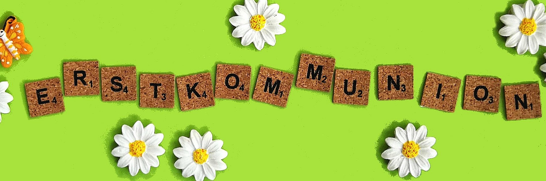 Schriftzug "Erstkommunion" mit Gänseblümchen